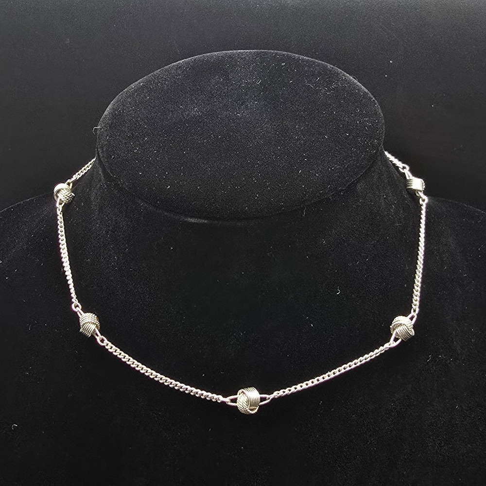 Avon 1977 Delicate Knot Necklace Silver Tone Chain Vintage Jewelry